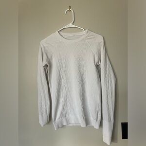 Lulu tech shirt. Old style that is thicker than the new version.